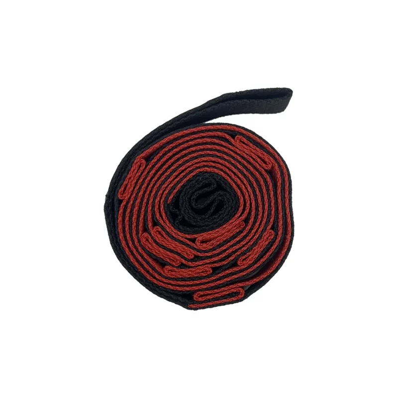 correa de estiramiento enrollada color negro con rojo